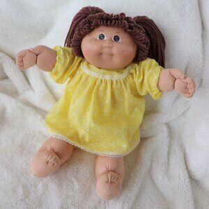 Vintage Cabbage Patch Kid with brown hair and brown eyes